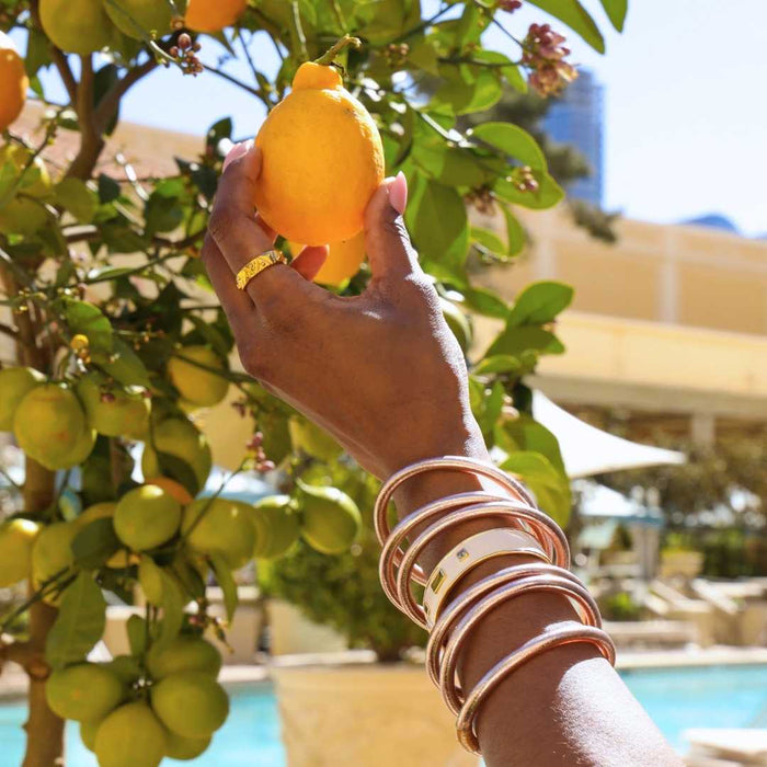 a person holding a lemon