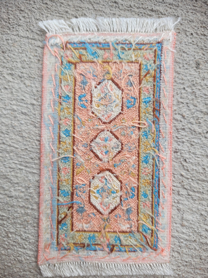 Petit Point Pastel Pink and Blue Hieroglyphic-Style Rug - Ursula Sauerberg