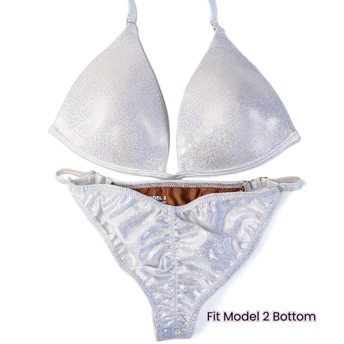 Pre Owned: Hologram White Fit Model Bundle. Medium Molded. Angel Competition BikinisThe best NPC Competition Suits for the Bikini Division, Fit Model Division Suits, and bodybuilding suits.