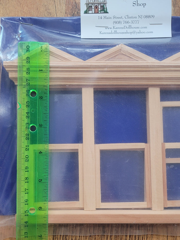 Triple Window with Hooded Pediment