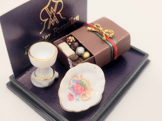 Box of Chocolates, Cup, and Plate by Reutter Porcelain