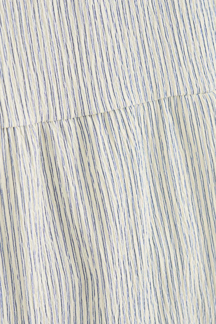 Rhythm Driftwood Stripe fabric and ruffle detail close-up