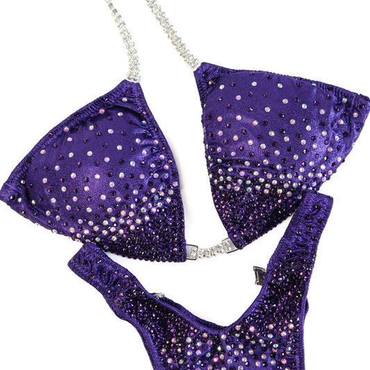 QS ST: Angel Firework. Hologram Eggplant. Medium/Standard Figure.  Angel Competition BikinisThe best NPC Competition Suits for the Bikini Division, Fit Model Division Suits, and bodybuilding suits.