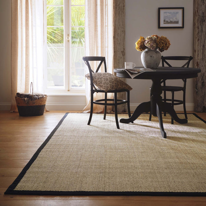 Sisal Rug- 100% Sisal rug with a black border.