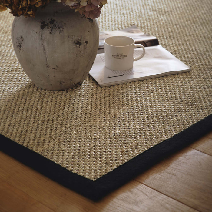 Sisal Rug- 100% Sisal rug with a black border.