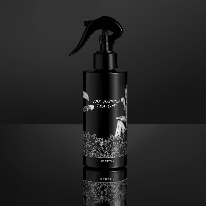 Haunted Tea Cosy bottle on black background