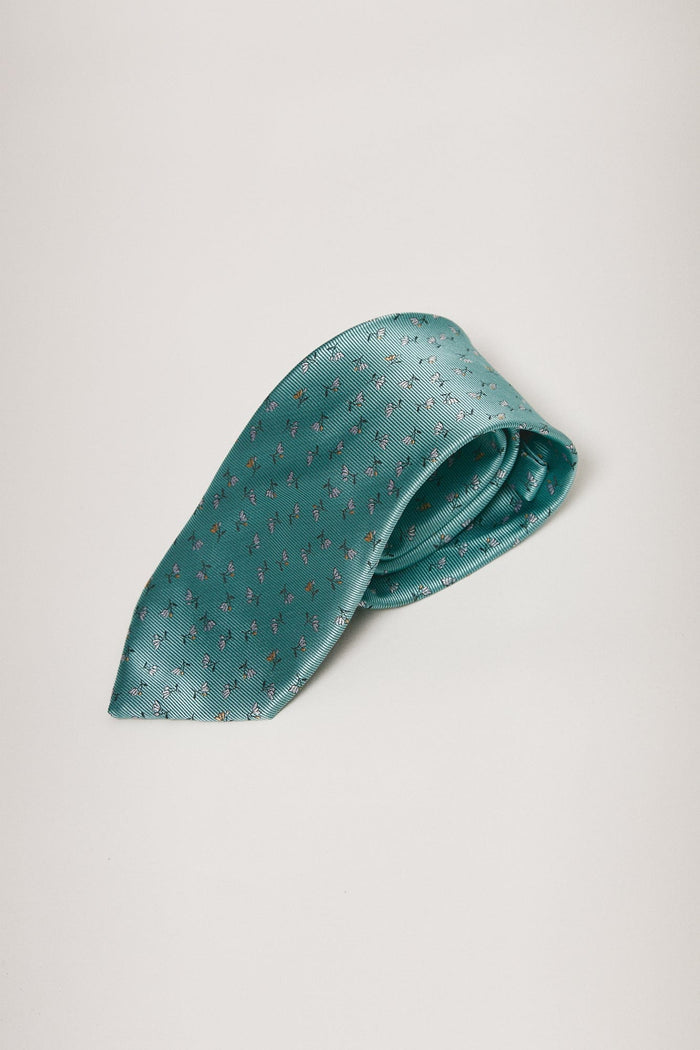 The Silk Tie Flor Fondo Turquesa