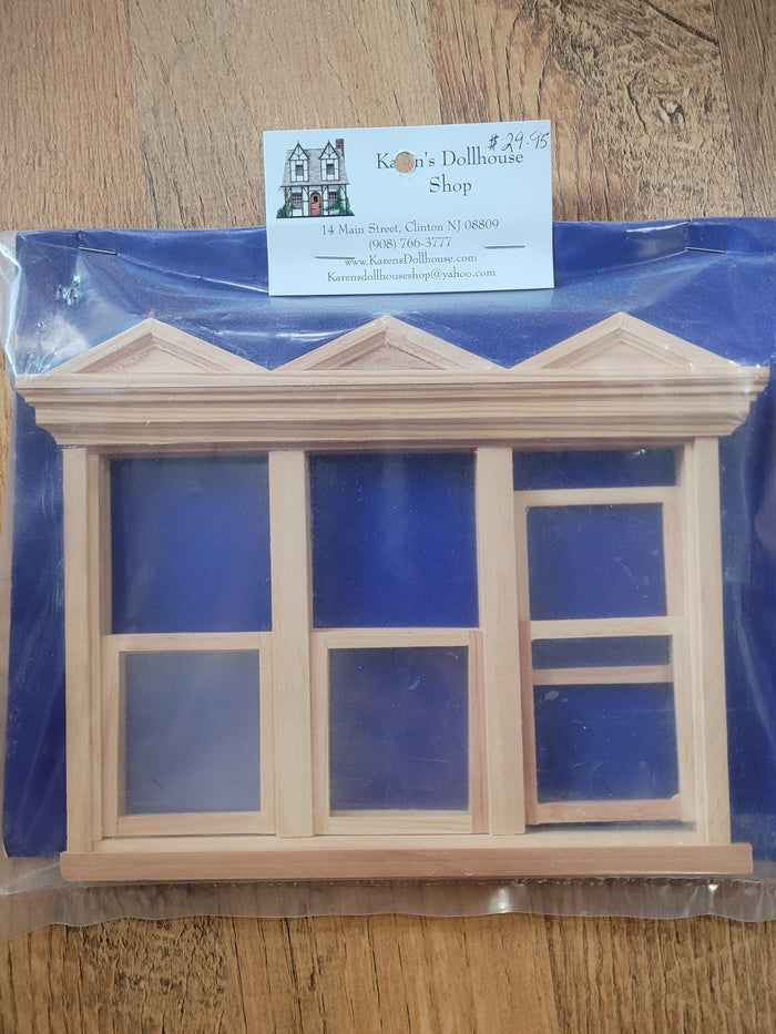 Triple Window with Hooded Pediment