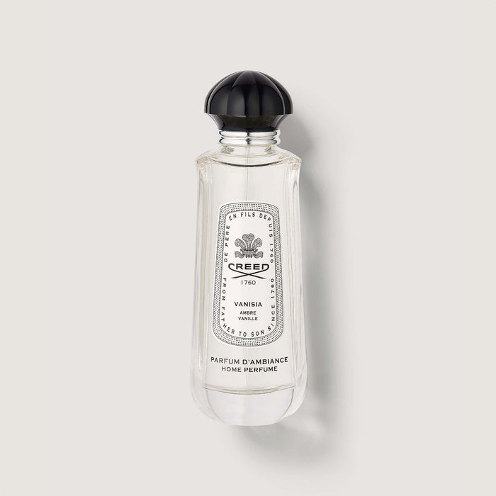 Clear glass Vanisia Room Spray bottle with black cap and engraved label - Front View | Creed Fragrances