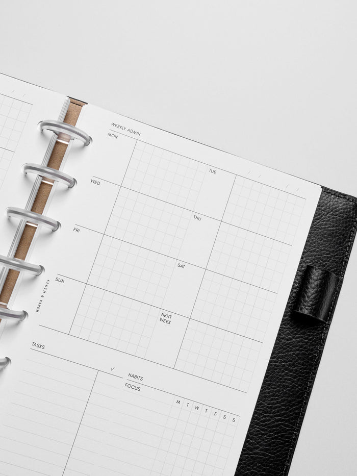 Insert in use inside a black leather planner.